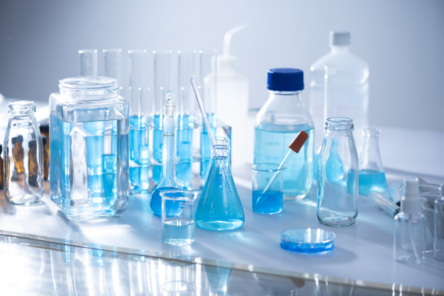 Chemical laboratory equipment Glassware for research and blue matter